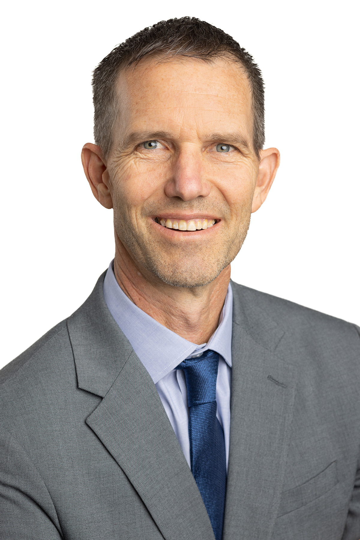 Skeet Frazee, attorney at Dillon, Miller, Ahuja & Boss, LLP, smiling in professional attire against a white background.
