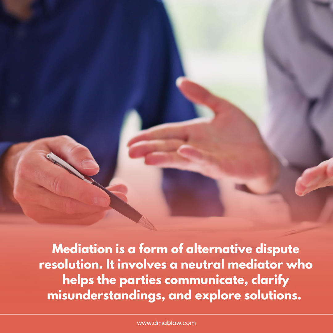 Hands of two individuals discussing mediation, with a pen on a document, emphasizing communication and resolution in real estate disputes.