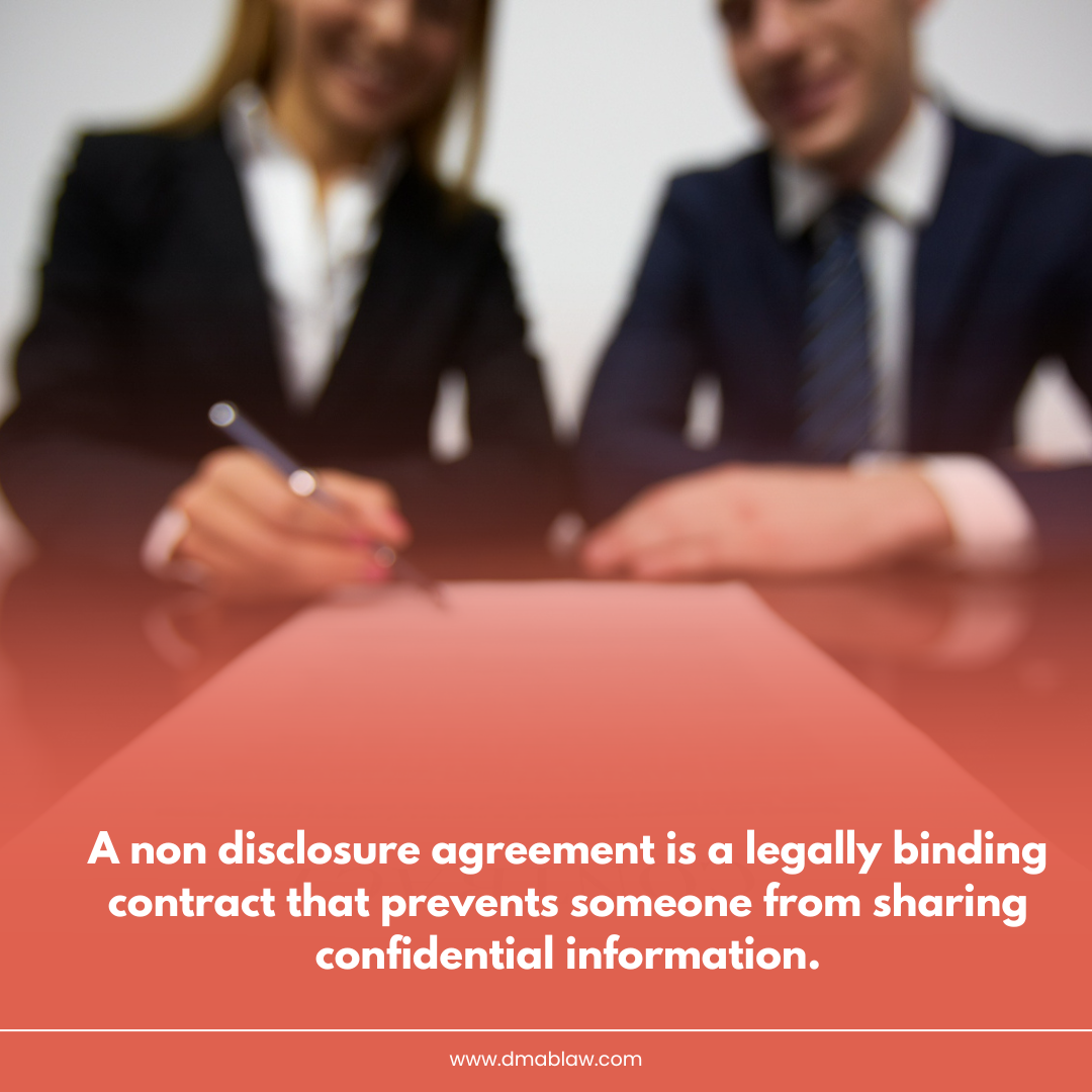 Business professionals signing a non-disclosure agreement, emphasizing confidentiality in California's legal context.