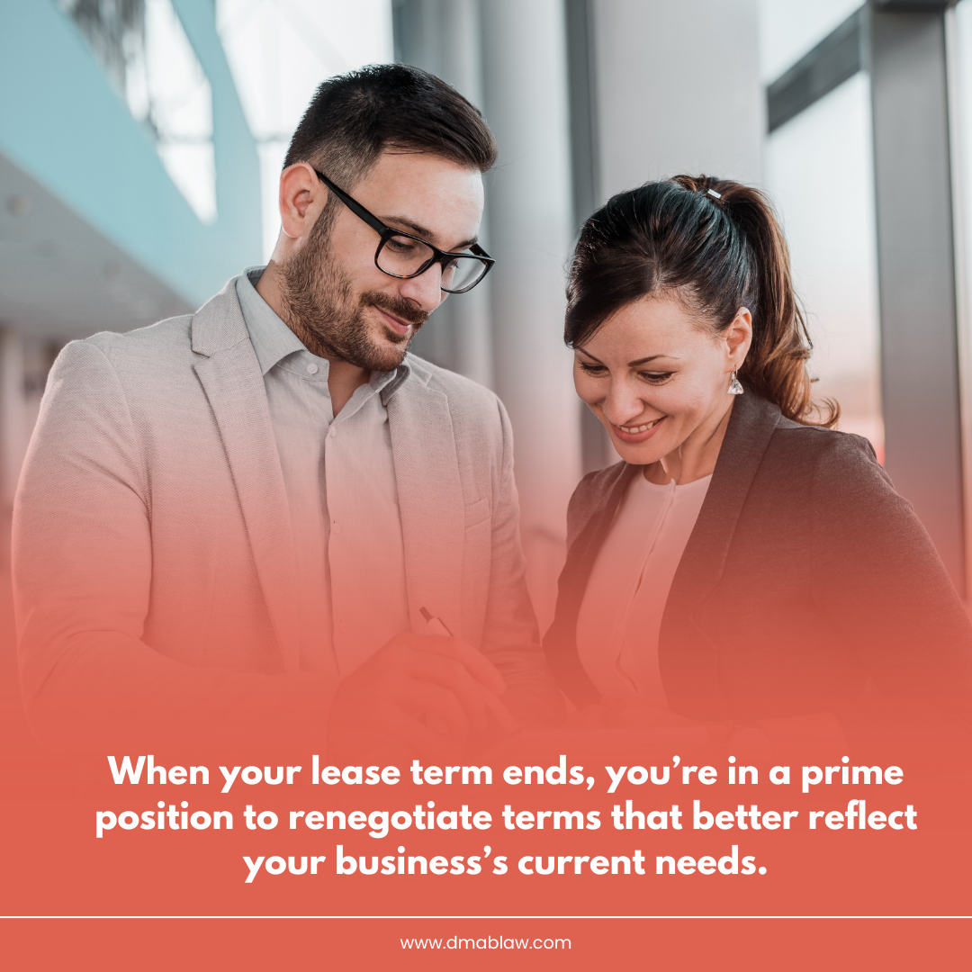 Business professionals discussing lease terms in a modern office setting, emphasizing the importance of renegotiating commercial lease agreements.