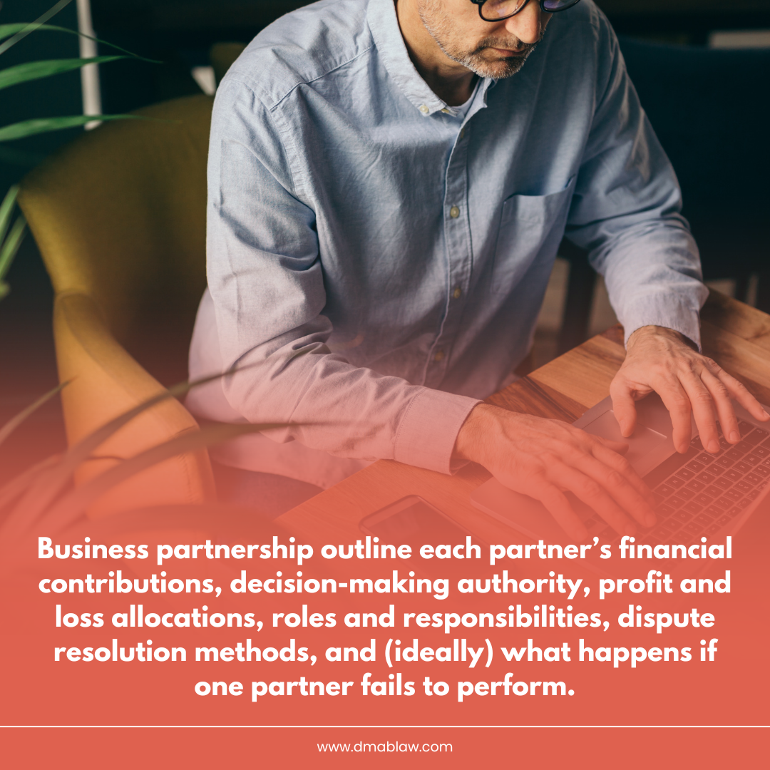 Business professional working on a laptop, illustrating partnership responsibilities, financial contributions, and decision-making authority in a business context.