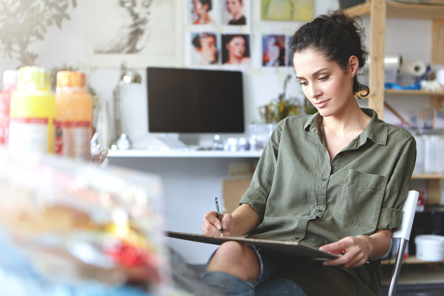 Small business owner developing original creative work while planning intellectual property protection strategies